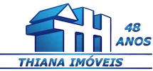 Logo Thiana Imóveis - 48 Anos